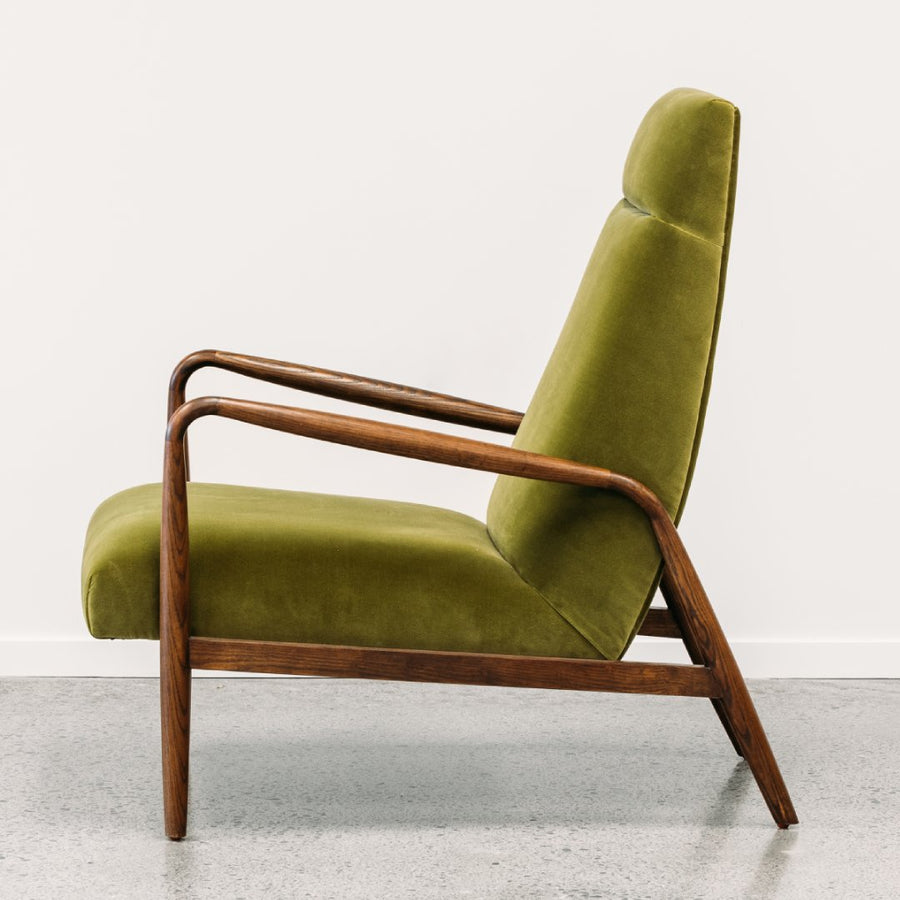 Mid-Century styled Aston Armchair in Olive velvet side profile view